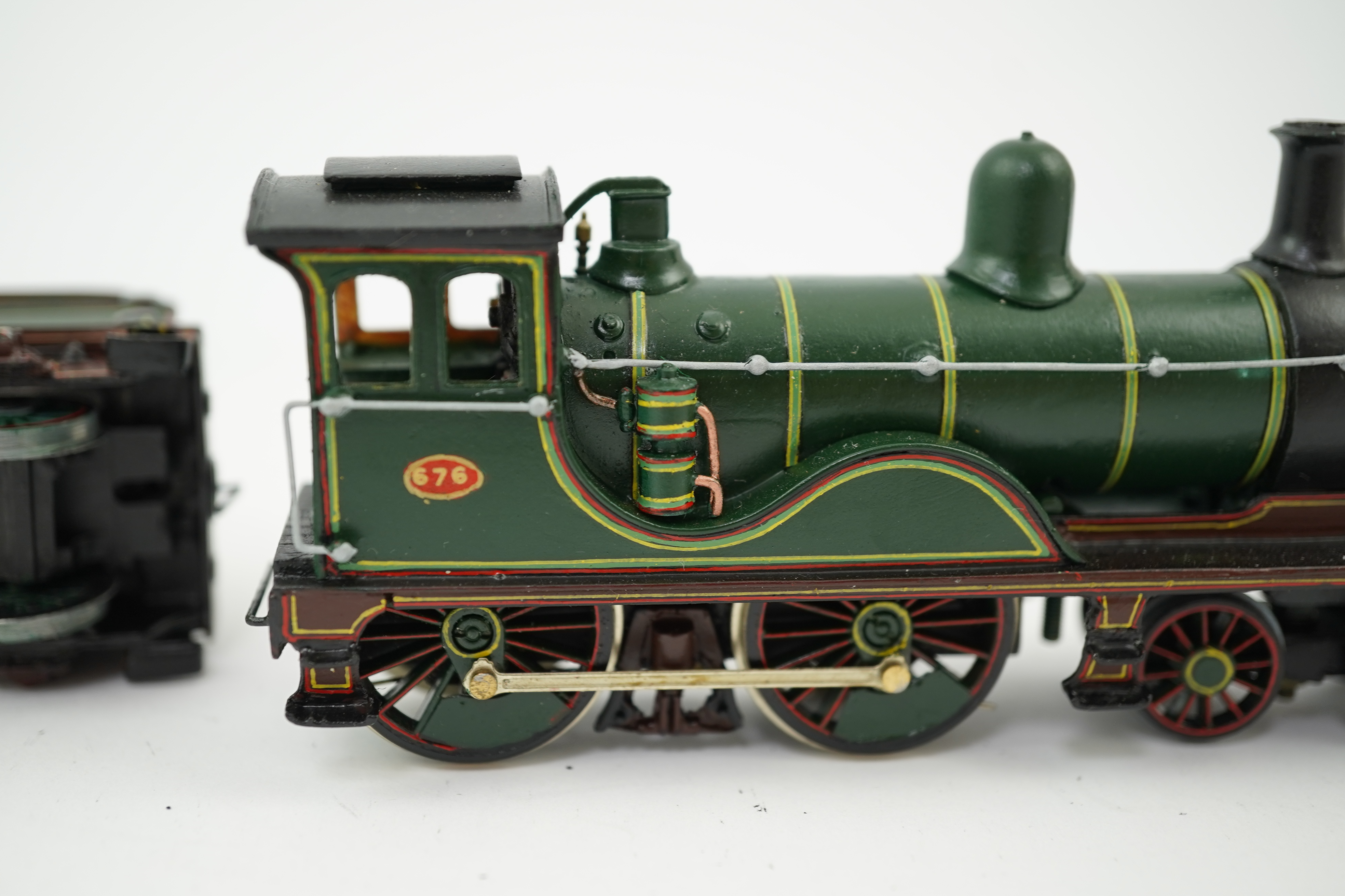 Two 00 gauge brass and white metal kit built Wainwright designed SE&CR locomotives (possibly by Wills Finecast); a class G 4-4-0, 676, together with a class S 0-6-0ST, 685, constructed, painted and lined to a high standa